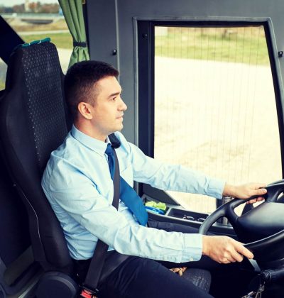 happy-driver-driving-intercity-bus-PFSCYEW